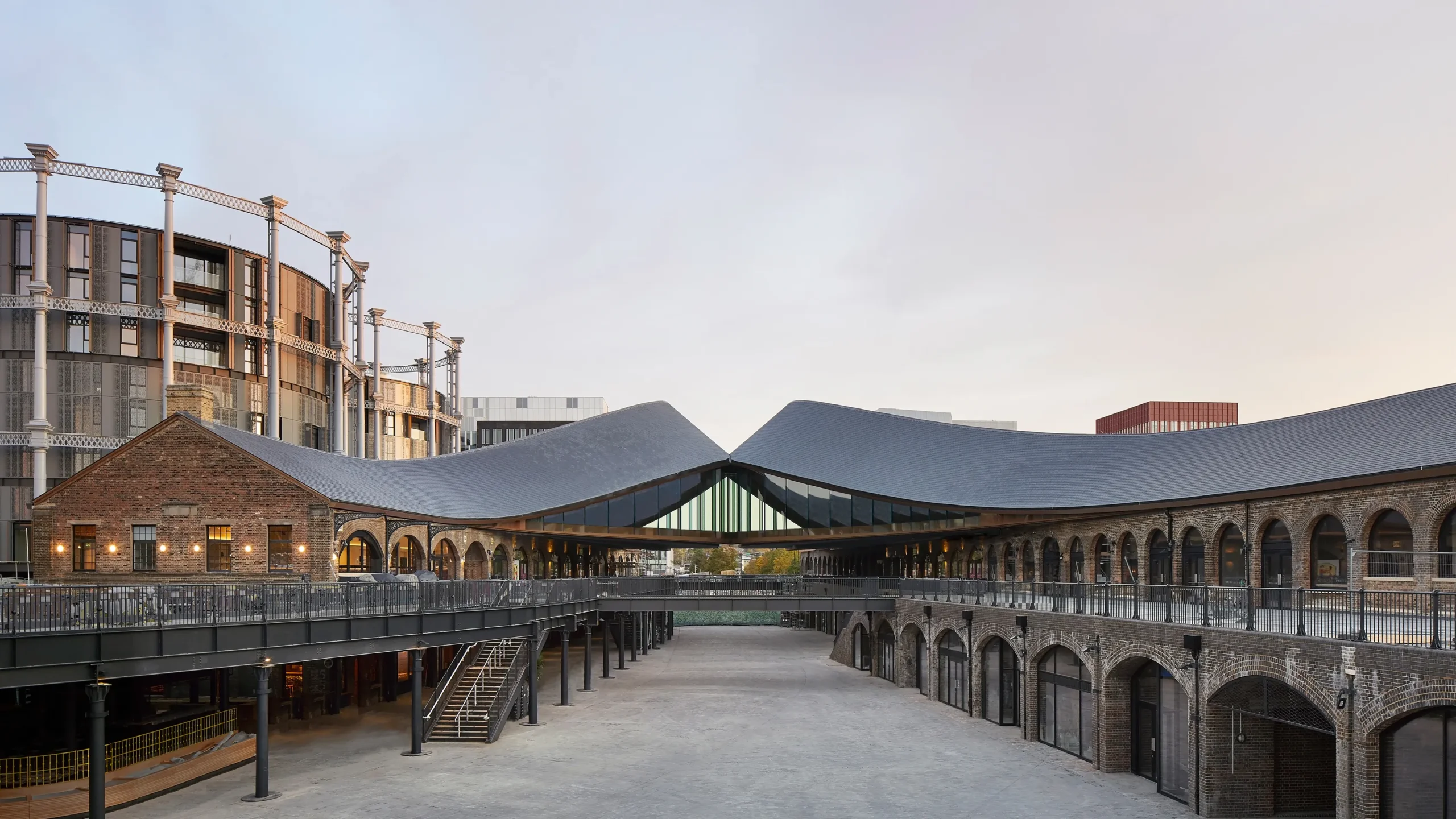 Coal Drops Yard in King’s Cross, London, showing its restored Victorian brick architecture and independent shops